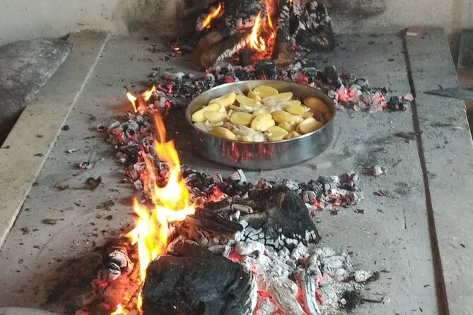 Croatian Traditional Cuisine: Peka Cooking Lesson - Sitting down to eat the finished peka