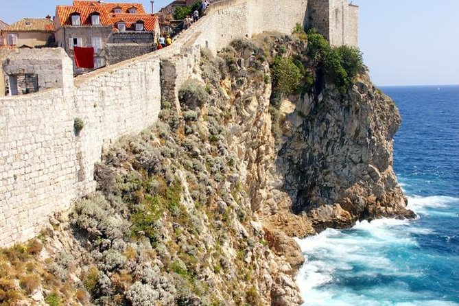 The walls, straight above the sea
