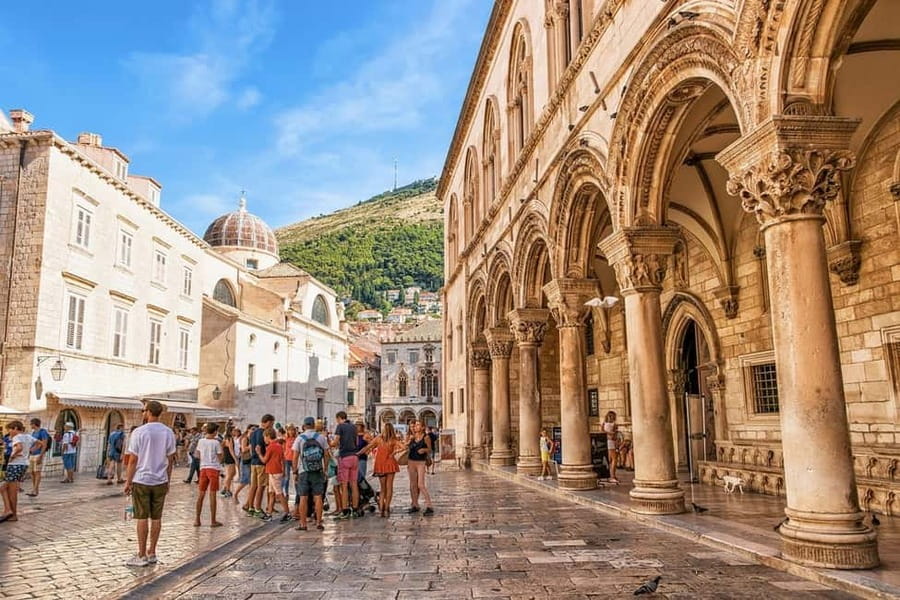 Dubrovnik: City Walls, Old Town Walking Tour & Adriatic View - Churches, the Cathedral, and Stories of Survival
