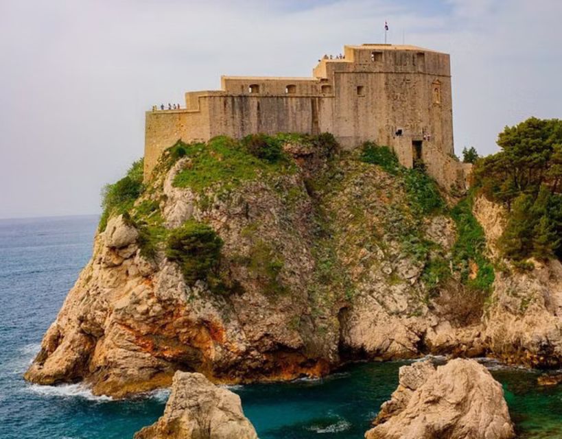 Dubrovnik: Group Tour & Panoramic Cruise - The city walls from offshore