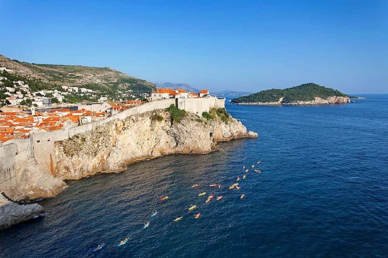 Dubrovnik: Guided Sunset Sea Kayaking with Snacks and Wine - Paddling beside the Dubrovnik City Walls