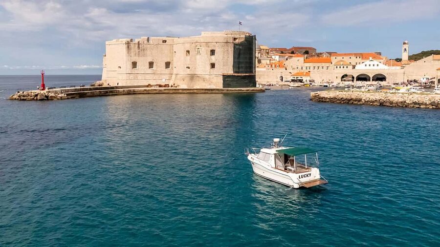 Dubrovnik: Lucky Boat Tour - Elaphite Islands and Blue Cave - Leaving Dubrovnik and viewing the Old Town from sea