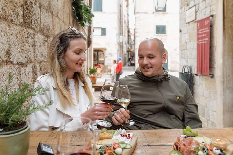 Dubrovnik Old Town: Night tour with History, Wine & Bites - Prosciutto, cheese, olives, and bread