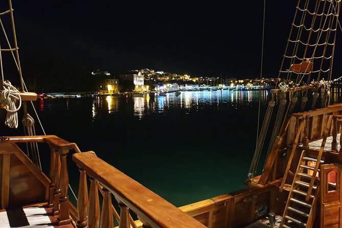 Dubrovnik Panoramic Night Cruise with Karaka - Returning through the port for the city lights
