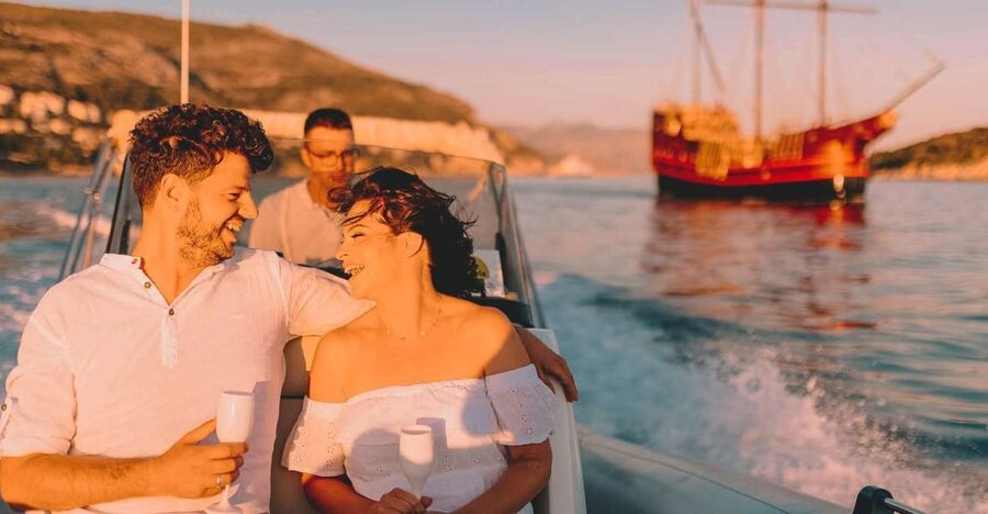 Dubrovnik: Private Boat Cruise at Sunset with Champagne - Seeing the Walls of Dubrovnik from offshore