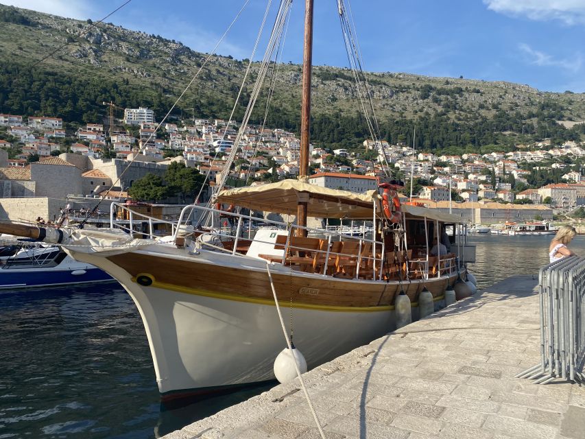 Dubrovnik: Sunset Dinner Cruise around the Old Town - Boarding the white Slavija in Dubrovnik’s Old Port