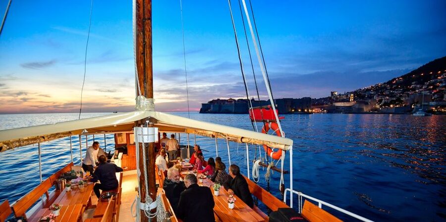 Dubrovnik: Sunset Dinner Cruise around the Old Town - Local liqueurs, seafood starters, and fresh bread