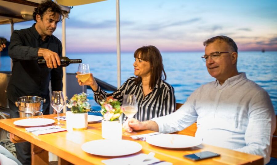 Dubrovnik: Sunset Dinner Cruise around the Old Town - Wine, candles, and the changing light