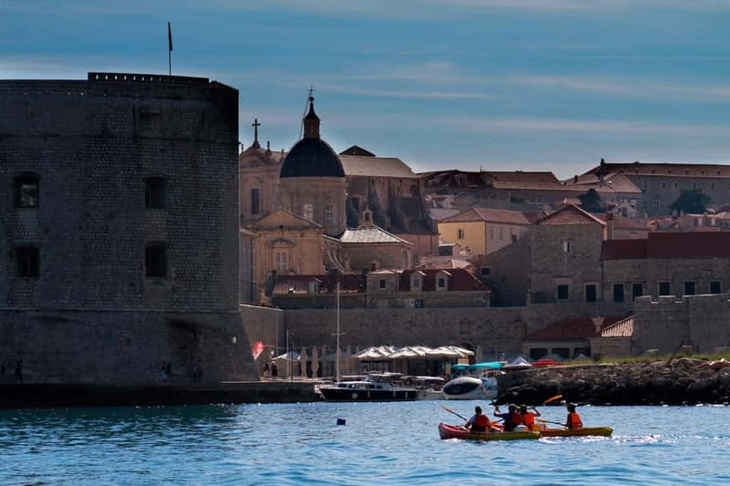 Dubrovnik: Sunset Sea Kayaking Tour - The Old Town walls from water level