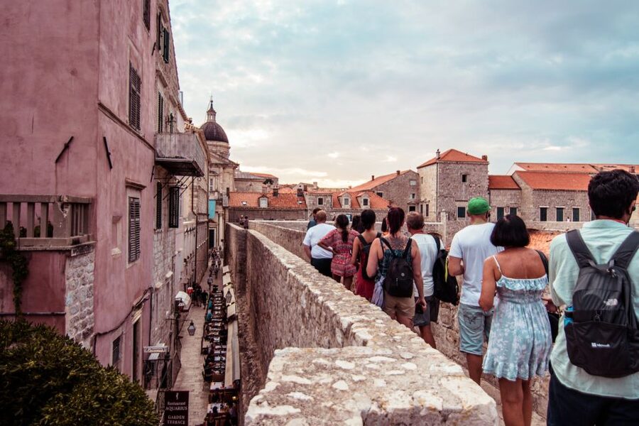 Dubrovnik: Walls and Wars Walking Tour - Meeting at Brsalje 8 by the orange umbrellas
