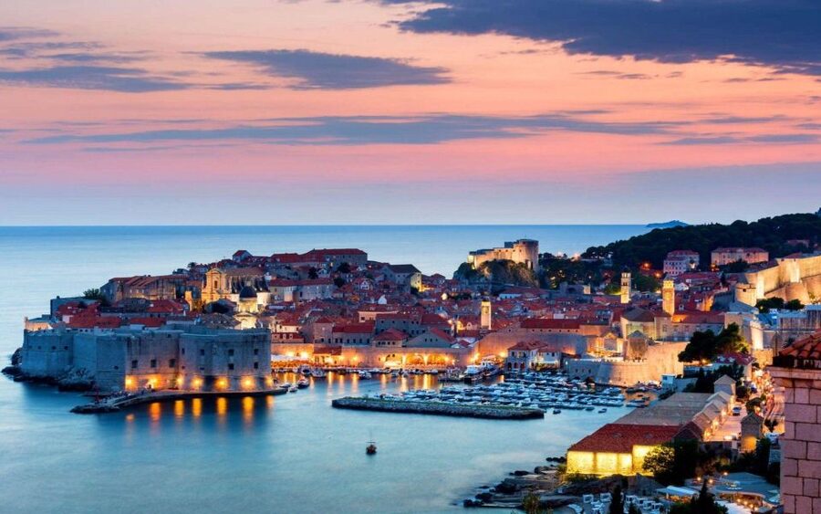 From Dubrovnik: Golden Hour Sunset Cruise with Free Drinks - Boarding a small boat instead of a crowded party vessel