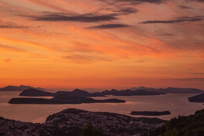 Golden hour SUNSET CRUISE from Dubrovnik Old Town - Champagne, dried fruit, and the onboard atmosphere