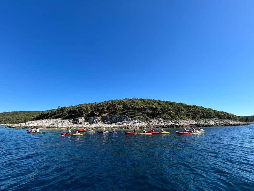Korcula Archipelago Kayak Tour - Moving through coves, caves, and rocky passages