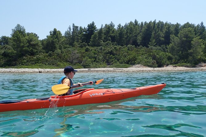 Lumbarda-Sunset Kayaking Experience with picnic: Wine and Sweets - The final paddle toward sunset