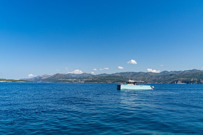 Luxury Blue Cave and Elaphiti Islands Small Group Tour - Šunj Beach brings sand to a pebbly coast