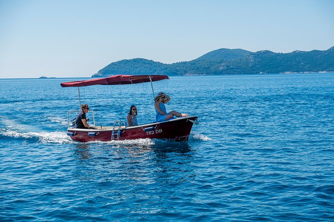 Rent a small boat without skipper - explore the islands and find hidden caves - Finding a cave and swimming in clear water