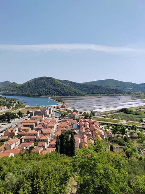 Ston private walking tour with the walls and saltworks visit - Climbing the central fortress above the salt pans