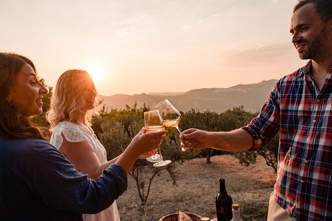 Sunset wine tasting in vineyard - Who Will Enjoy This Most?